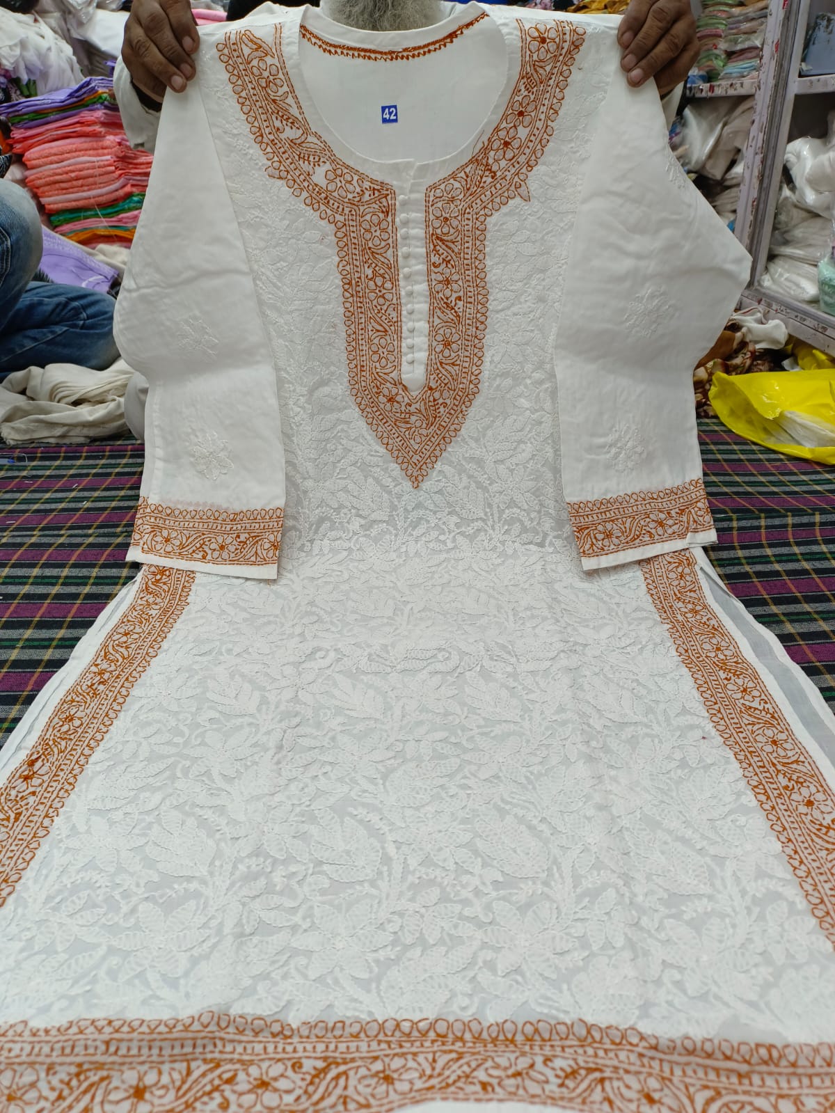 Voil cotton kurta with color thread chikankari on neck Daman and seleaves